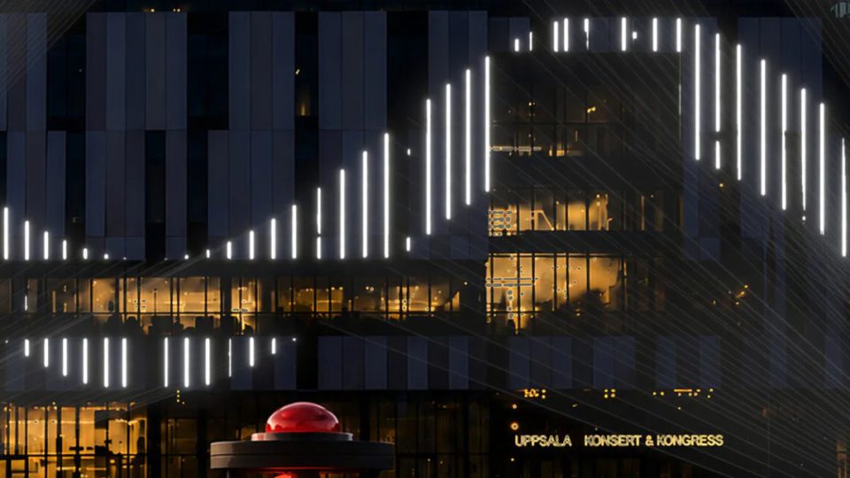 AI-genererad bild på UKK:s fasad med ett ljusprojicering.
